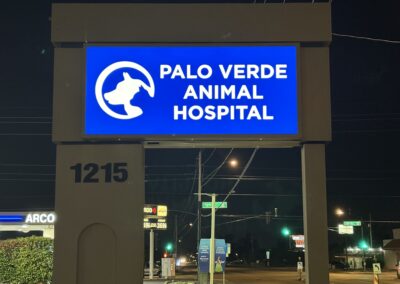 Illuminated sign for Palo Verde Animal Hospital, designed by Arizona Custom Signworks, located at 1215 under night sky in Phoenix.