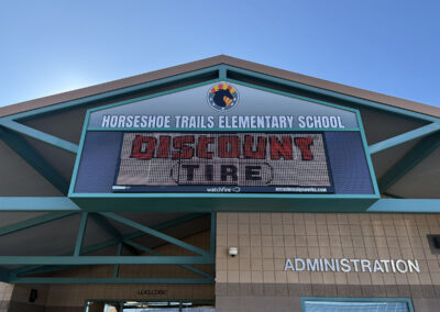 Horseshoe Trails Elementary School sign by Arizona Custom Signworks, displaying Discount Tire, in North Phoenix, AZ.