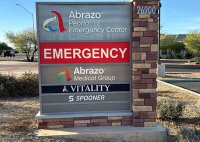 Abrazo Peoria Emergency Center sign displaying emergency services and medical groups in Peoria, Arizona, crafted by Arizona Custom Signworks.